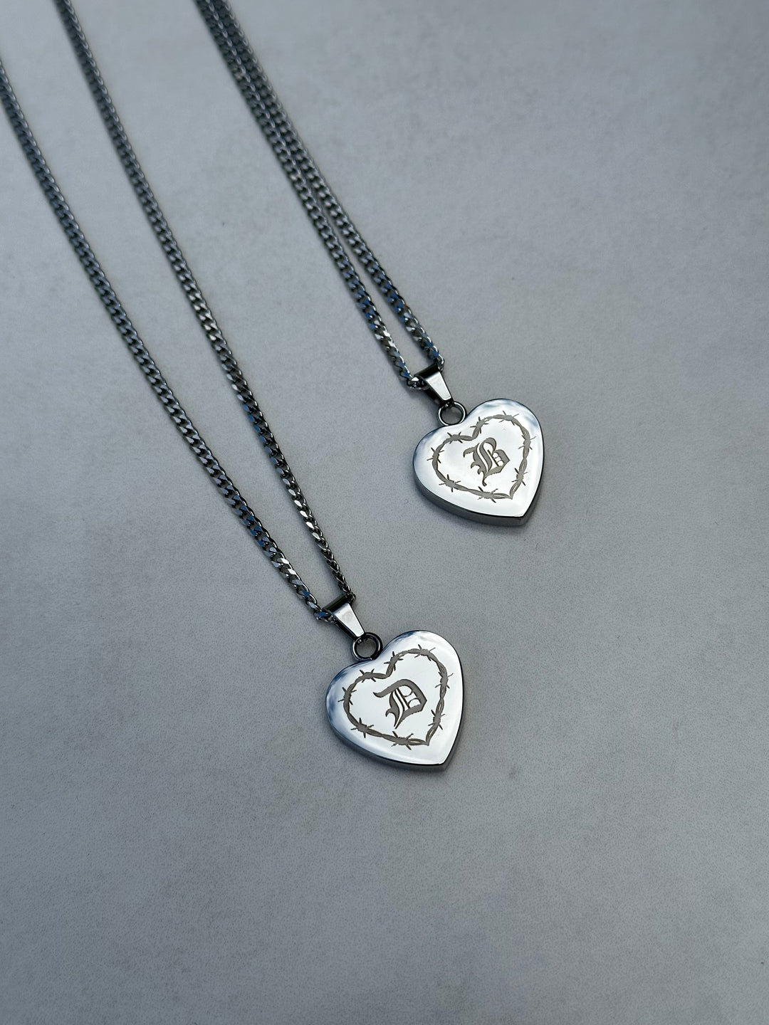 INITIAL BARBED HEART NECKACE