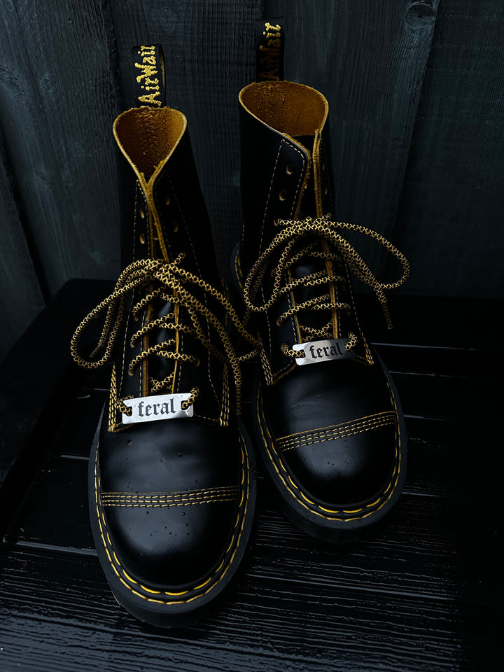 ‘FERAL’ METAL SHOE/LACE TAGS