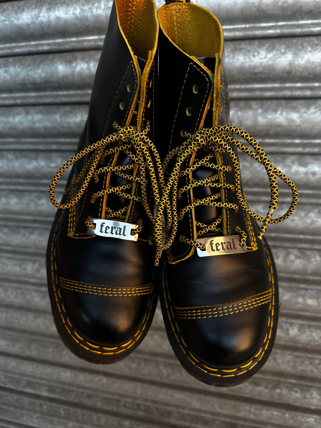 ‘FERAL’ METAL SHOE/LACE TAGS