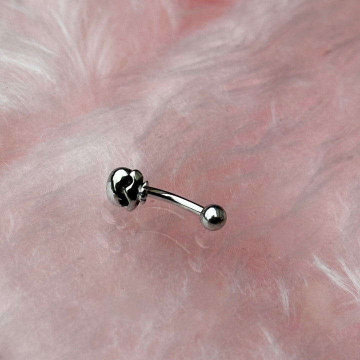 SINGLE SKULL CURVED BAR - EYEBROW / VERTICAL LABRET