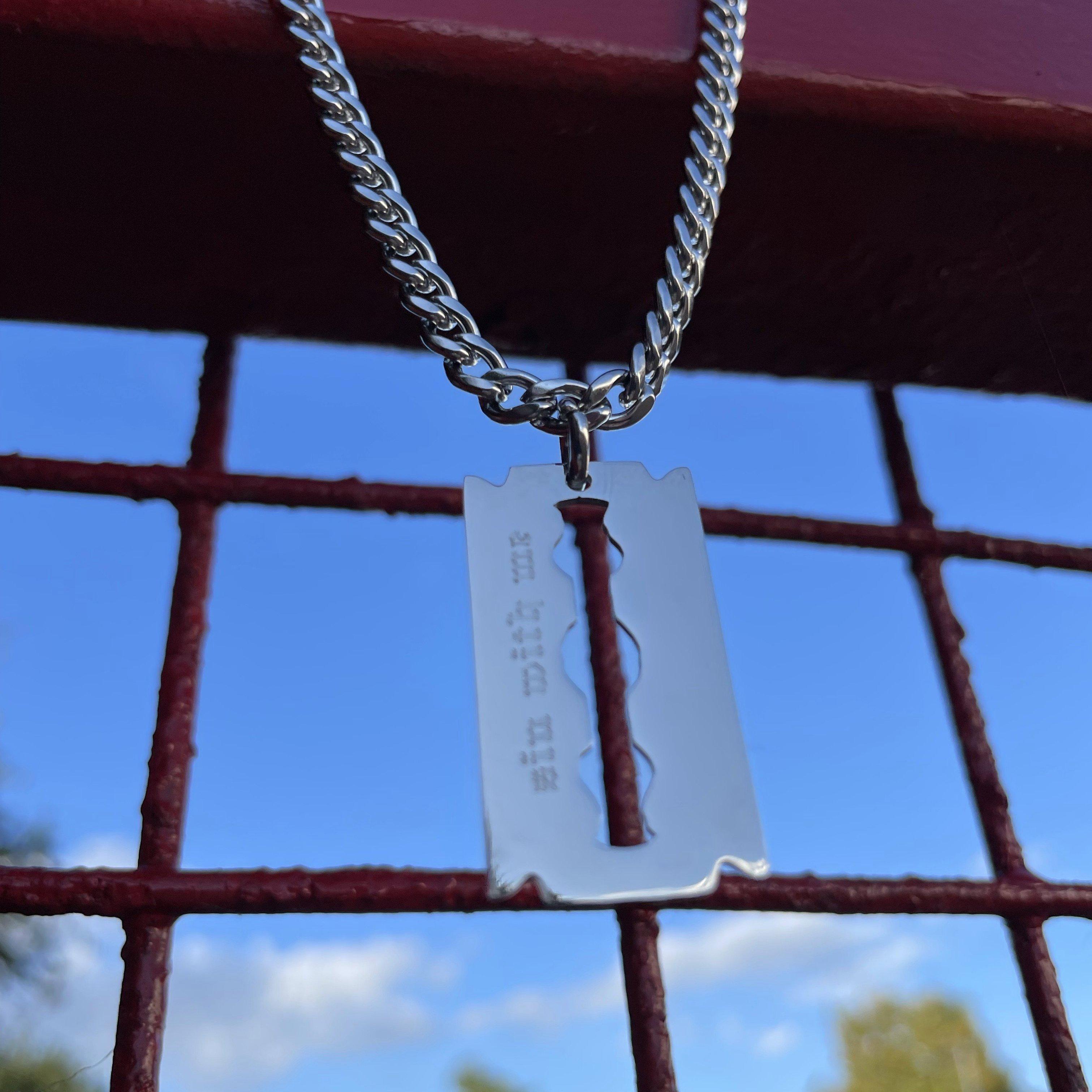 Silver razor blade on sale pendant